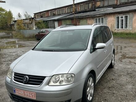 Фольксваген Туран 2006 у Косове на Automoto.ua Сірий Фольксваген Туран, об'ємом двигуна 1.6 л та пробігом 235 тис. км за 5900 $, фото 1 на Automoto.ua