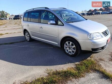 Серый Фольксваген Туран, объемом двигателя 1.6 л и пробегом 243 тыс. км за 5999 $, фото 1 на Automoto.ua