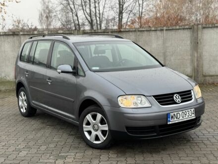 Серый Фольксваген Туран, объемом двигателя 2 л и пробегом 370 тыс. км за 2550 $, фото 1 на Automoto.ua