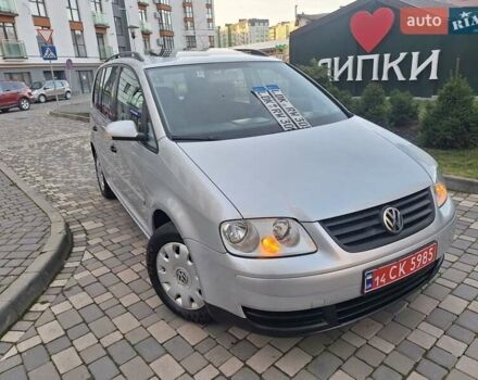 Серый Фольксваген Туран, объемом двигателя 1.6 л и пробегом 214 тыс. км за 6299 $, фото 1 на Automoto.ua