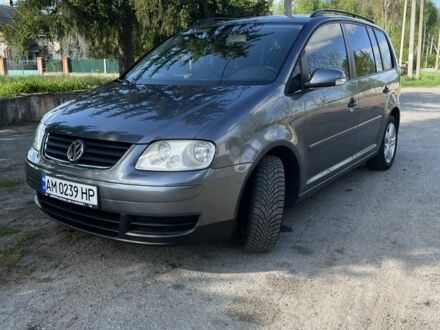 Серый Фольксваген Туран, объемом двигателя 1.4 л и пробегом 240 тыс. км за 5300 $, фото 1 на Automoto.ua