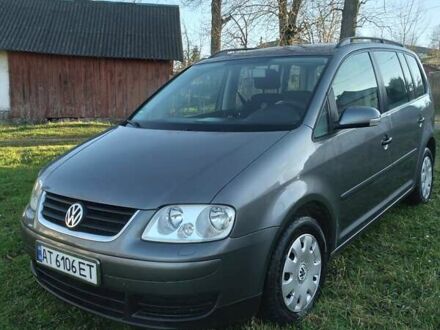 Серый Фольксваген Туран, объемом двигателя 2 л и пробегом 269 тыс. км за 5950 $, фото 1 на Automoto.ua