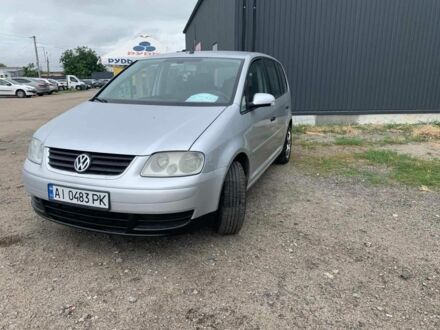 Серый Фольксваген Туран, объемом двигателя 1.9 л и пробегом 260 тыс. км за 5900 $, фото 1 на Automoto.ua