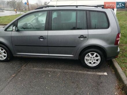 Серый Фольксваген Туран, объемом двигателя 1.4 л и пробегом 295 тыс. км за 5450 $, фото 1 на Automoto.ua