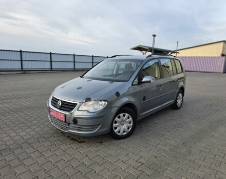 Серый Фольксваген Туран, объемом двигателя 1.4 л и пробегом 215 тыс. км за 5350 $, фото 1 на Automoto.ua