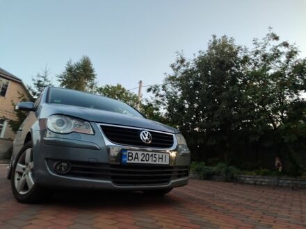 Серый Фольксваген Туран, объемом двигателя 1.4 л и пробегом 246 тыс. км за 6900 $, фото 1 на Automoto.ua