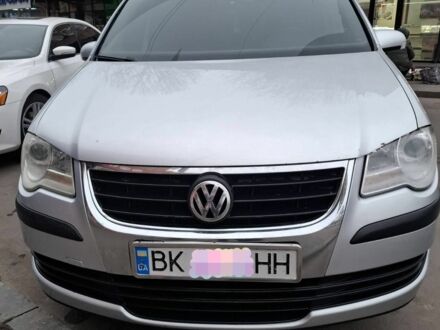 Сірий Фольксваген Туран, об'ємом двигуна 0 л та пробігом 318 тис. км за 7200 $, фото 1 на Automoto.ua
