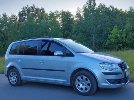 Фольксваген Туран 2007 в Рокитном на Automoto.ua Серый Фольксваген Туран, объемом двигателя 1.4 л и пробегом 200 тыс. км за 7500 $, фото 1 на Automoto.ua
