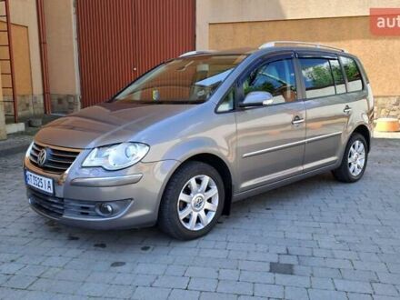 Фольксваген Туран 2007 у Коломые на Automoto.ua Сірий Фольксваген Туран, об'ємом двигуна 1.39 л та пробігом 248 тис. км за 6550 $, фото 1 на Automoto.ua