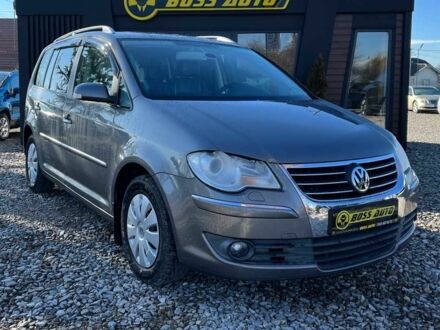 Серый Фольксваген Туран, объемом двигателя 1.4 л и пробегом 242 тыс. км за 7000 $, фото 1 на Automoto.ua