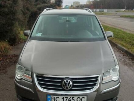 Серый Фольксваген Туран, объемом двигателя 1.4 л и пробегом 217 тыс. км за 7200 $, фото 1 на Automoto.ua