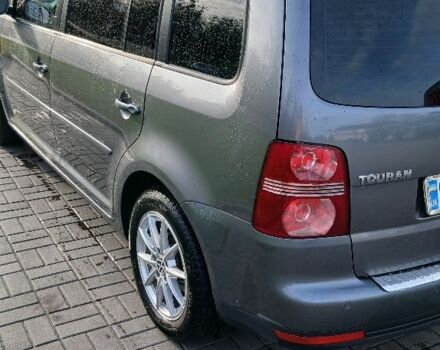 Серый Фольксваген Туран, объемом двигателя 1.4 л и пробегом 277 тыс. км за 6300 $, фото 1 на Automoto.ua