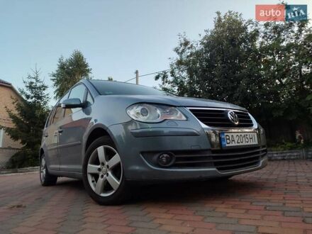 Сірий Фольксваген Туран, об'ємом двигуна 1.4 л та пробігом 246 тис. км за 6900 $, фото 1 на Automoto.ua