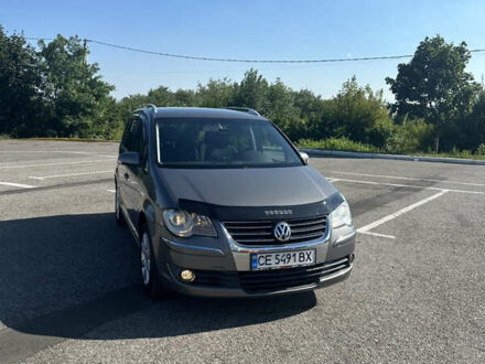 Сірий Фольксваген Туран, об'ємом двигуна 2 л та пробігом 240 тис. км за 7200 $, фото 1 на Automoto.ua