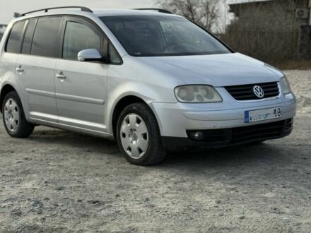 Сірий Фольксваген Туран, об'ємом двигуна 2 л та пробігом 380 тис. км за 3199 $, фото 1 на Automoto.ua