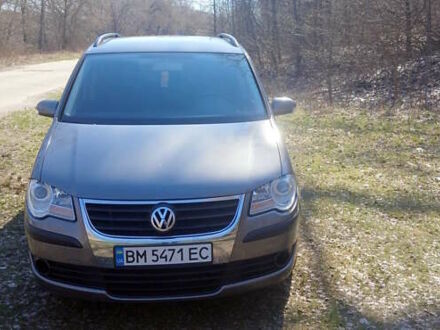 Фольксваген Туран 2007 в Новгород-Северском на Automoto.ua Серый Фольксваген Туран, объемом двигателя 1.39 л и пробегом 197 тыс. км за 5500 $, фото 1 на Automoto.ua