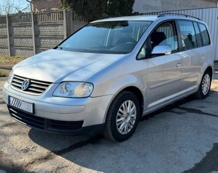 Сірий Фольксваген Туран, об'ємом двигуна 2 л та пробігом 300 тис. км за 3400 $, фото 1 на Automoto.ua