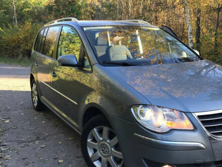 Серый Фольксваген Туран, объемом двигателя 1.4 л и пробегом 268 тыс. км за 6200 $, фото 1 на Automoto.ua