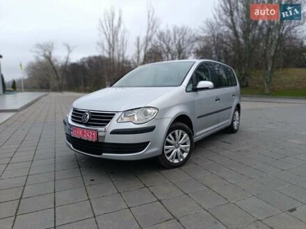 Серый Фольксваген Туран, объемом двигателя 1.6 л и пробегом 237 тыс. км за 7100 $, фото 1 на Automoto.ua