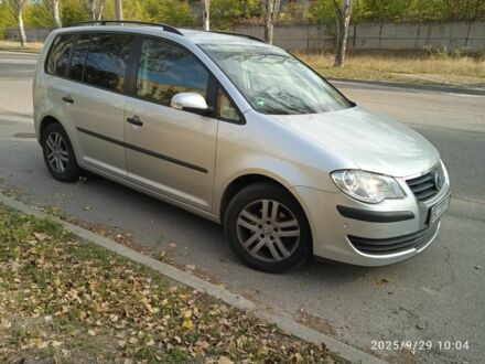 Сірий Фольксваген Туран, об'ємом двигуна 1.4 л та пробігом 231 тис. км за 6999 $, фото 1 на Automoto.ua