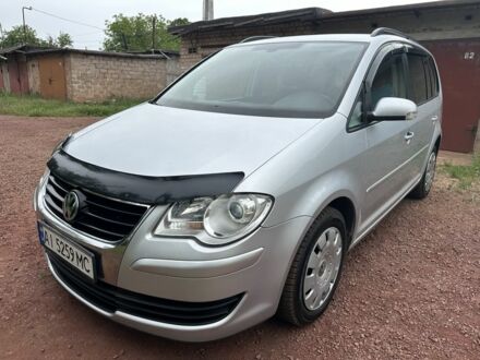 Фольксваген Туран 2007 у Кривому Розі на Automoto.ua Сірий Фольксваген Туран, об'ємом двигуна 1.4 л та пробігом 187 тис. км за 6500 $, фото 1 на Automoto.ua