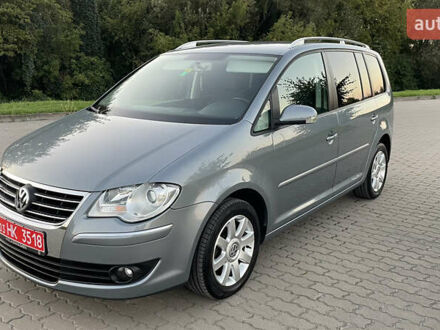 Серый Фольксваген Туран, объемом двигателя 1.4 л и пробегом 188 тыс. км за 7650 $, фото 1 на Automoto.ua