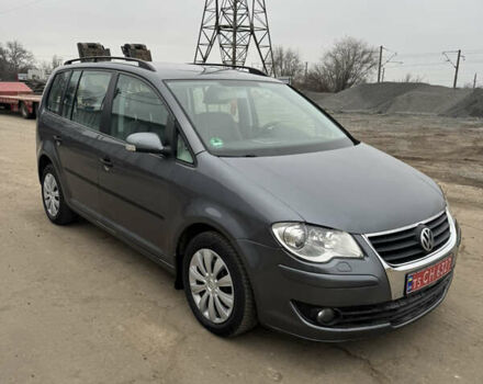 Серый Фольксваген Туран, объемом двигателя 1.4 л и пробегом 185 тыс. км за 7500 $, фото 1 на Automoto.ua