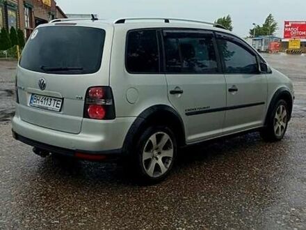 Серый Фольксваген Туран, объемом двигателя 1.4 л и пробегом 317 тыс. км за 7500 $, фото 1 на Automoto.ua