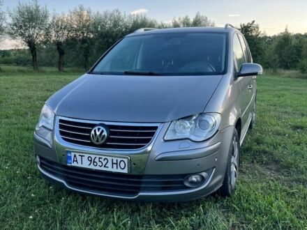 Серый Фольксваген Туран, объемом двигателя 2 л и пробегом 306 тыс. км за 6900 $, фото 1 на Automoto.ua
