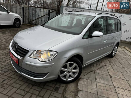 Серый Фольксваген Туран, объемом двигателя 1.4 л и пробегом 149 тыс. км за 7300 $, фото 1 на Automoto.ua