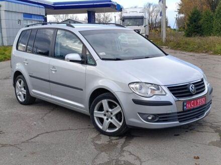 Серый Фольксваген Туран, объемом двигателя 1.4 л и пробегом 227 тыс. км за 5999 $, фото 1 на Automoto.ua