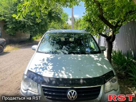 Серый Фольксваген Туран, объемом двигателя 2 л и пробегом 345 тыс. км за 6600 $, фото 1 на Automoto.ua