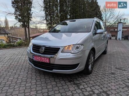 Серый Фольксваген Туран, объемом двигателя 1.4 л и пробегом 201 тыс. км за 6999 $, фото 1 на Automoto.ua