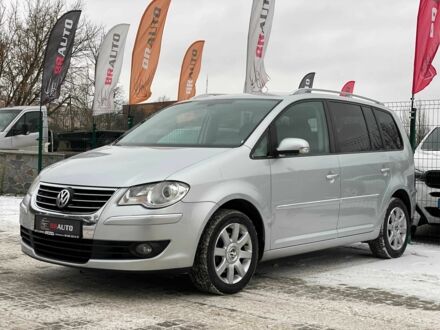 Сірий Фольксваген Туран, об'ємом двигуна 1.4 л та пробігом 207 тис. км за 8299 $, фото 1 на Automoto.ua