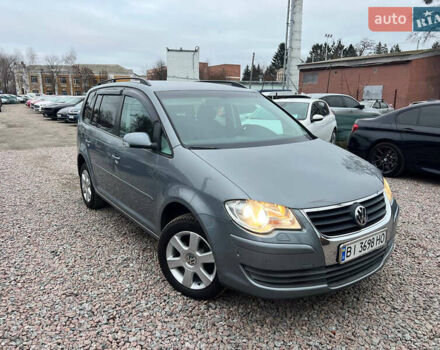 Сірий Фольксваген Туран, об'ємом двигуна 1.4 л та пробігом 189 тис. км за 7700 $, фото 1 на Automoto.ua