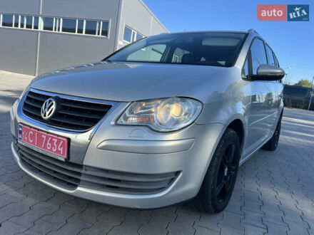 Серый Фольксваген Туран, объемом двигателя 1.4 л и пробегом 235 тыс. км за 7450 $, фото 1 на Automoto.ua