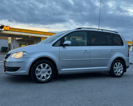 Сірий Фольксваген Туран, об'ємом двигуна 1.6 л та пробігом 212 тис. км за 8499 $, фото 1 на Automoto.ua