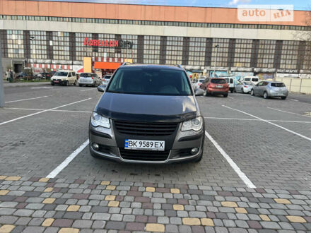 Фольксваген Туран 2009 в Луцке на Automoto.ua Серый Фольксваген Туран, объемом двигателя 1.97 л и пробегом 246 тыс. км за 8400 $, фото 1 на Automoto.ua