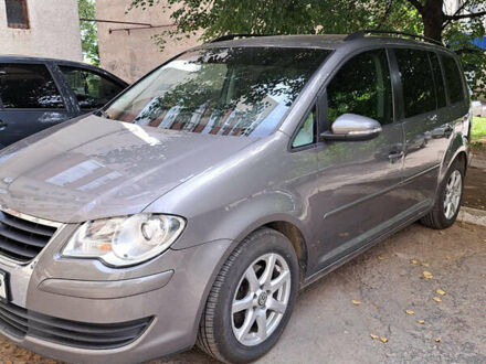 Фольксваген Туран 2009 в Новоднестровск на Automoto.ua Серый Фольксваген Туран, объемом двигателя 1.4 л и пробегом 199 тыс. км за 7300 $, фото 1 на Automoto.ua