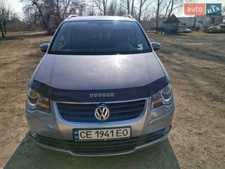 Фольксваген Туран 2009 в Черновцах на Automoto.ua Серый Фольксваген Туран, объемом двигателя 2 л и пробегом 183 тыс. км за 7500 $, фото 1 на Automoto.ua