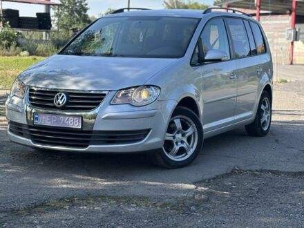 Фольксваген Туран 2009 у Новых Санжарах на Automoto.ua Сірий Фольксваген Туран, об'ємом двигуна 2 л та пробігом 232 тис. км за 6000 $, фото 1 на Automoto.ua