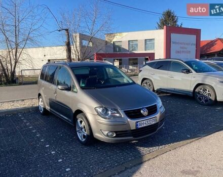 Серый Фольксваген Туран, объемом двигателя 1.4 л и пробегом 233 тыс. км за 5400 $, фото 1 на Automoto.ua