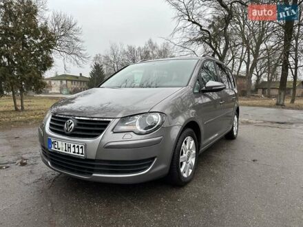 Фольксваген Туран 2010 в Лебедине на Automoto.ua Серый Фольксваген Туран, объемом двигателя 1.6 л и пробегом 228 тыс. км за 9100 $, фото 1 на Automoto.ua