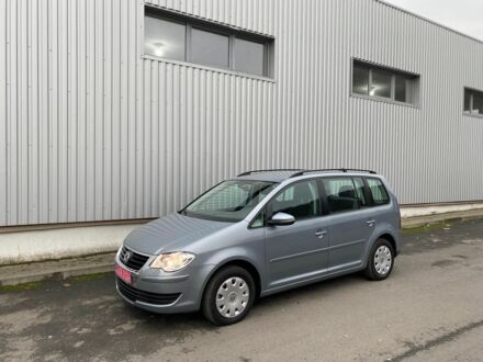 Сірий Фольксваген Туран, об'ємом двигуна 1.4 л та пробігом 221 тис. км за 7900 $, фото 1 на Automoto.ua