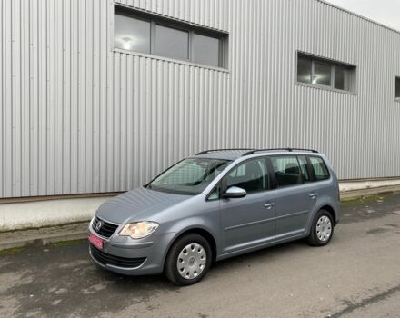 Серый Фольксваген Туран, объемом двигателя 1.4 л и пробегом 221 тыс. км за 7900 $, фото 1 на Automoto.ua