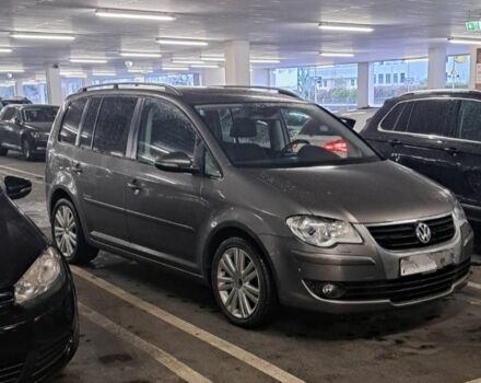 Серый Фольксваген Туран, объемом двигателя 1.4 л и пробегом 216 тыс. км за 4300 $, фото 1 на Automoto.ua