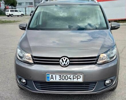 Серый Фольксваген Туран, объемом двигателя 1.4 л и пробегом 223 тыс. км за 9500 $, фото 1 на Automoto.ua