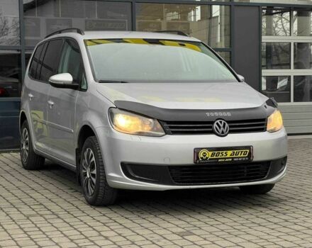 Серый Фольксваген Туран, объемом двигателя 1.4 л и пробегом 224 тыс. км за 7500 $, фото 1 на Automoto.ua