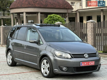 Серый Фольксваген Туран, объемом двигателя 1.4 л и пробегом 217 тыс. км за 9750 $, фото 1 на Automoto.ua