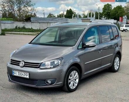 Серый Фольксваген Туран, объемом двигателя 1.4 л и пробегом 223 тыс. км за 9500 $, фото 1 на Automoto.ua